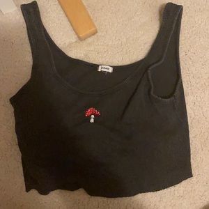 Garage crop top with a mushroom size small it’s a black ish grey